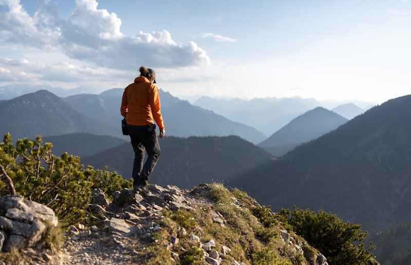 Hiker on an exposed mountain ridgeline on the Ridgeline Traverse